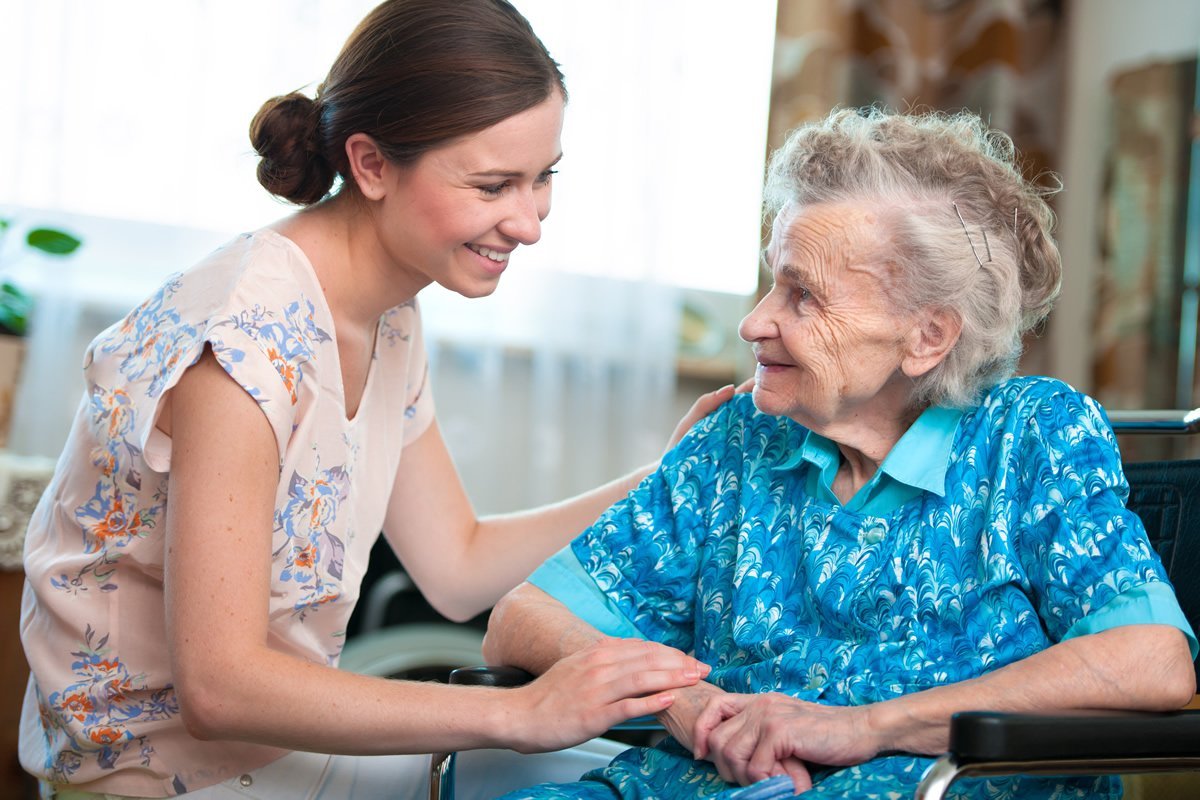 Woman Comforts Senior Woman